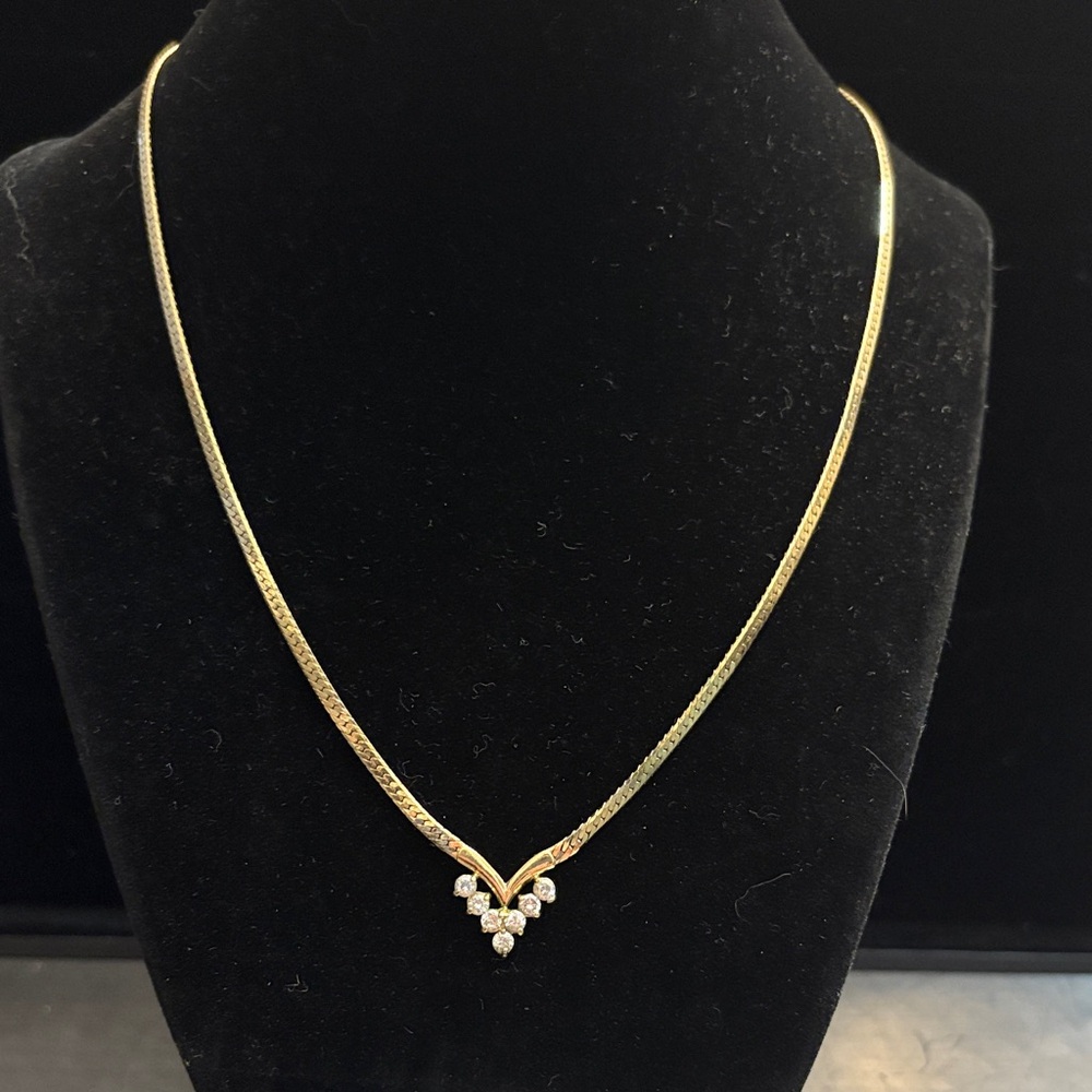 Elegant Gold Necklace with 7 clear stones Accents